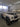 weiß lackierter Land Rover Defender 90 nach Lackierung Teilzusammenbau in Montage Kabine